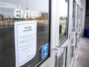 A closed Cineplex cinema is seen after the company announced it is temporarily laying off 6,000 part-time employees due to mandated closures of its venues amid surging COVID-19 cases caused by the Omicron variant, in Toronto, Jan. 6, 2022.