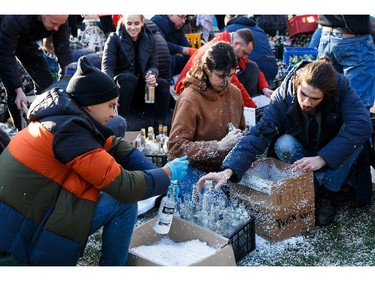 Local residents prepare Molotov cocktails to defend the city, after Russia launched a massive military operation against Ukraine, in Uzhhorod, Ukraine Feb. 27, 2022.