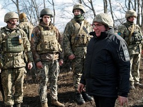 Secretary of Ukraine's National Security and Defence Council Oleksiy Danilov visits combat positions of the Ukrainian armed forces near the line of separation from Russian-backed rebels, near the village of Bohdanivka in the Donetsk region, Ukraine February 19, 2022.