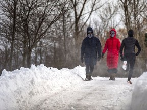 People were bundled up as they headed out to Ashbridges Bay Park in Toronto on Feb. 19, 2022.