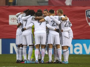 Toronto FC players huddle before the match against FC Dallas.