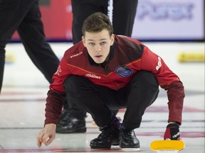 Team NL skip Nathan Young looks down the ice.