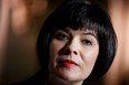 Ginette Petitpas Taylor listens to a question during a news conference on Parliament Hill in Ottawa.