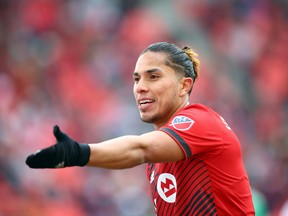 Carlos Salcedo of Toronto FC reacts as the referee checks the VAR during the second half of an MLS game at BMO Field against New York Red Bulls on March 05, 2022 in Toronto.