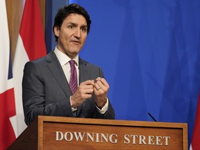 Prime Minster Justin Trudeau speaks at a joint press conference attended by Britain's Prime Minister Boris Johnson, and Netherlands Prime Minister Mark Rutte, where they gave an update on the Russian invasion of Ukraine, at Downing Street on March 7, 2022 in London.