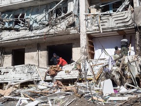 A view to the residential building in Mostytska Street which got hit by a rocket on March 15, 2022 in Kyiv.