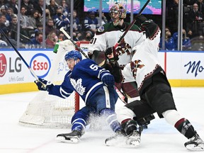 Toronto Maple Leafs forward Michael Bunting collides with Arizona Coyotes defenceman Shayne Gostisbehere.