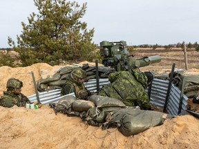 Members of the Canadian army participate in the Crystal Arrow 2022 exercise on March 8, 2022 in Adazi, Latvia.