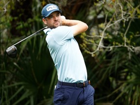 Corey Conners of Canada plays his shot from the fifth tee during the first round of THE PLAYERS Championship on the Stadium Course at TPC Sawgrass on Thursday.