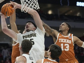 At 7-foot-4, Toronto’s Zach Edey of the Purdue Boilermakers will be hard to miss in Friday’s tilt against Saint Peter’s.