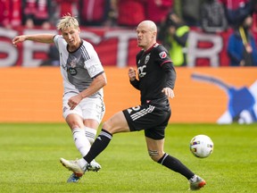 Toronto FC defender Lukas MacNaughton (5) moves the ball against D.C. United.