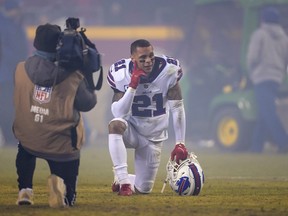 Buffalo Bills free safety Jordan Poyer  kneels on the field after an NFL divisional round playoff football game against the Kansas City Chiefs.