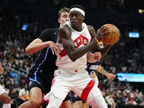 Toronto Raptors forward Pascal Siakam (43) controls the ball against Orlando Magic forward Franz Wagner (22) during the first half at Scotiabank Arena.