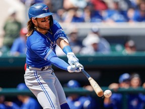 Toronto Blue Jays shortstop Bo Bichette (11) at bat in the third inning against the Detroit Tigers during spring training at Publix Field at Joker Marchant Stadium.