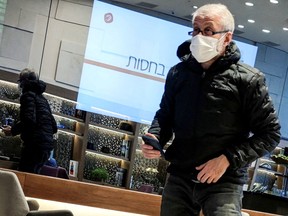 Sanctioned Russian oligarch Roman Abramovich stands in a VIP lounge before a jet linked to him took off for Istanbul from Ben Gurion international airport in Lod near Tel Aviv, Israel, March 14, 2022.