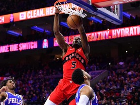 Toronto Raptors forward Precious Achiuwa (5) dunks the ball in the first quarter against the Philadelphia 76ers at Wells Fargo Center.