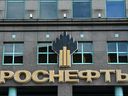 In this file photo taken on April 18, 2021, The logo of Russia's oil producer Rosneft is pictured on its headquarters in Moscow. 