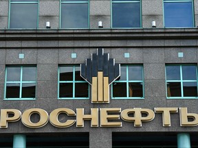 In this file photo taken on April 18, 2021, The logo of Russia's oil producer Rosneft is pictured on its headquarters in Moscow.