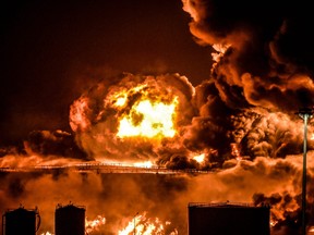 Smoke and flames rise from a Saudi Aramco oil facility in Saudi Arabia's Red Sea coastal city of Jeddah, on March 25, 2022, following a reported Yemeni rebels attack.