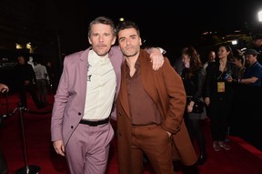 Ethan Hawke and Oscar Isaac attend the Moon Knight Los Angeles Special Launch Event at the El Capitan Theatre.