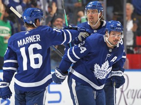 Maple Leafs' Auston Matthews celebrates his 50th goal of the season against the Winnipeg Jets at Scotiabank Arena on Thursday, March 31, 2022 in Toronto.