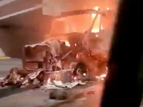 A truck is seen ablaze in the Mexican border city of Nuevo Laredo following the arrest of the gang leader Juan Gerardo Trevino in Nuevo Laredo, Mexico, in this screen grab taken from a video obtained from social media March 14, 2022.