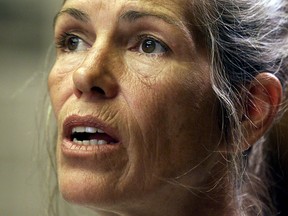 Leslie Van Houten listens during her parole hearing in Corona, Calif., June 28, 2002.