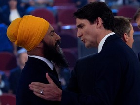Liberal Leader Justin Trudeau and NDP Leader Jagmeet Singh shake hands following the federal leaders French language debate in Gatineau, Quebec, October 10, 2019.