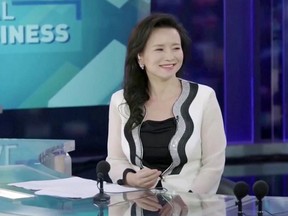 Australian journalist Cheng Lei is seen on a television set in Beijing, China, in this still image taken from undated video footage.