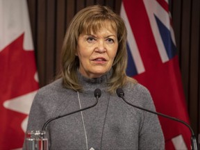 Ontario Health Minister Christine Elliott attends a press briefing at the Ontario legislature in Toronto, Friday, Dec. 10, 2021.