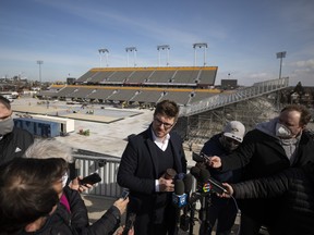 Toronto Maple Leafs general manager Kyle Dubas speaks to the media at Tim Hortons Field ahead of the NHL Heritage Classic outdoor game in Hamilton, Ont., Friday, March 4, 2022. The Buffalo Sabres and Toronto Maple Leafs will face off in the 2022 Heritage Classic later this month.