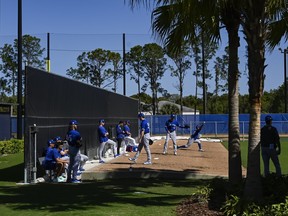 Toronto Blue Jays pitchers throw in the bullpen during a spring training workout earlier this month in Dunedin. The Jays’ projected starting rotation, according to catcher Danny Jansen, presents opposing teams with a mix of styles that could put pitching staff among the best in the major leagues this season.