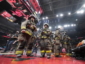 Fans were evacuated from Saturday night's Raptors game when an overhead speaker caught fire.