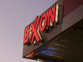 Signage is seen at an Exxon gas station in Brooklyn November 23, 2021.