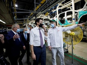 Ontario Premier Doug Ford and Prime Minister Justin Trudeau visit the production facilities of Honda Canada Manufacturing in Alliston, Ont., Wednesday, March 16, 2022.