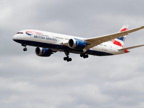 A British Airways Boeing 787 comes in to land at Heathrow airport in west London. (Photo by ADRIAN DENNIS/AFP via Getty Images)
