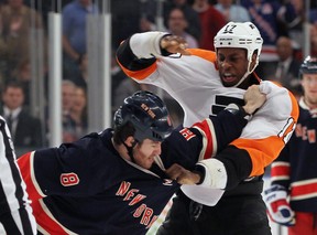 NEW YORK, NY – NOVEMBER 26: Wayne Simmonds of the Philadelphia Flyers and Brandon Prust #8 of the New York Rangers fight during the first period at Madison Square Garden on November 26, 2011 in New York City. (Photo by Bruce Bennett/Getty Images)