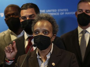 Chicago Mayor Lori Lightfoot (C) speaks during a news conference at the 90th Winter Meeting of United States Conference of Mayors (USCM) on January 19, 2022 in Washington, DC.(Photo by Alex Wong/Getty Images)
