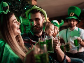 The company of young people celebrate St. Patrick's Day.