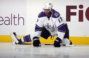 UNIONDALE, NY – OCTOBER 12: Wayne Simmonds of the Los Angeles Kings stretches during warm-up prior to their NHL game against the New York Islanders at the Nassau Coliseum on October 12, 2009 in Uniondale, New York. The Kings defeated the Islanders 2-1. (Photo by Bruce Bennett/Getty Images)