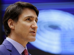 Prime Minister Justin Trudeau addresses European lawmakers ahead of a NATO summit and G7 meeting, amid Russia's invasion of Ukraine, in Brussels, Belgium, Wednesday, March 23, 2022.