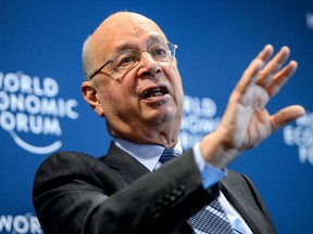 World Economic Forum founder and executive chairman Klaus Schwab gestures during a news conference at the Forum's headquarters in Cologny, near Geneva, on January 15, 2013.