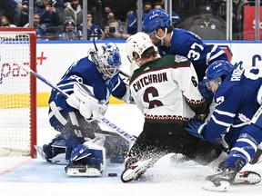 Maple Leafs goalie Erik Kallgren makes a save on a shot from Arizona Coyotes' Jakob Chychrun during the second period at Scotiabank Arena on Thursday, March 10, 2022.