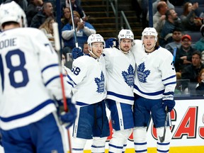Maple Leafs' Auston Matthews is congratulated by his teammates after scoring a goal during the first period against the Columbus Blue Jackets at Nationwide Arena on March 7, 2022 in Columbus, Ohio.