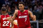 Kyle Lowry of the Heat reacts during the fourth quarter against the Dallas Mavericks at American Airlines Center. 