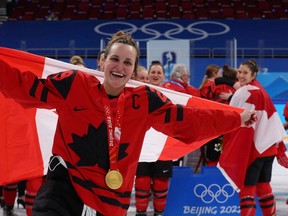 Marie-Philip Poulin led Canada to a gold medal at the Beijing Olympics.