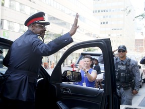 Mark Saunders leaves police headquarters on his last day as Toronto's police chief, on Friday, July 31, 2020.