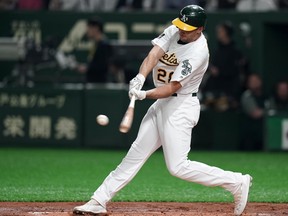 Matt Olson of the Oakland Athletics hits against the Seattle Mariners at Tokyo Dome on March 20, 2019 in Tokyo, Japan.