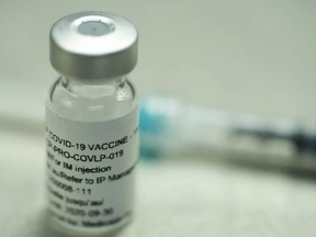 A vial of a plant-derived COVID-19 vaccine candidate, developed by Medicago, is shown in Quebec City on Monday, July 13, 2020 as part of the company’s Phase 1 clinical trials in this handout photo.