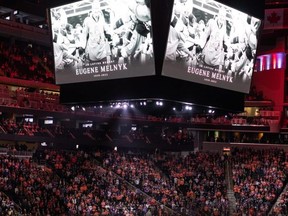 A moment of silence is held in memory of Ottawa Senators owner Eugene Melnyk in Edmonton. It is believed that a handful of potential ownership groups have already expressed an interest in purchasing the money-losing Senators. Ian Kucerak/Postmedia